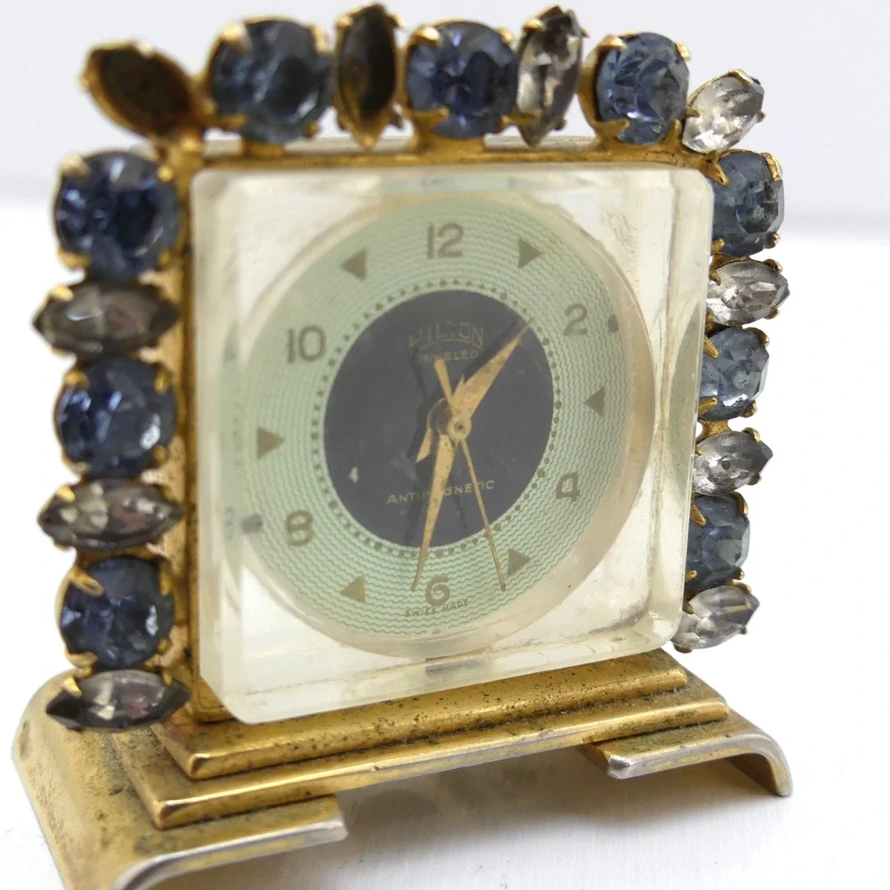 VTG Hilton Jeweled Antimagnetic Mini Skeleton Desk Clock Gold Tone Swiss Quartz
